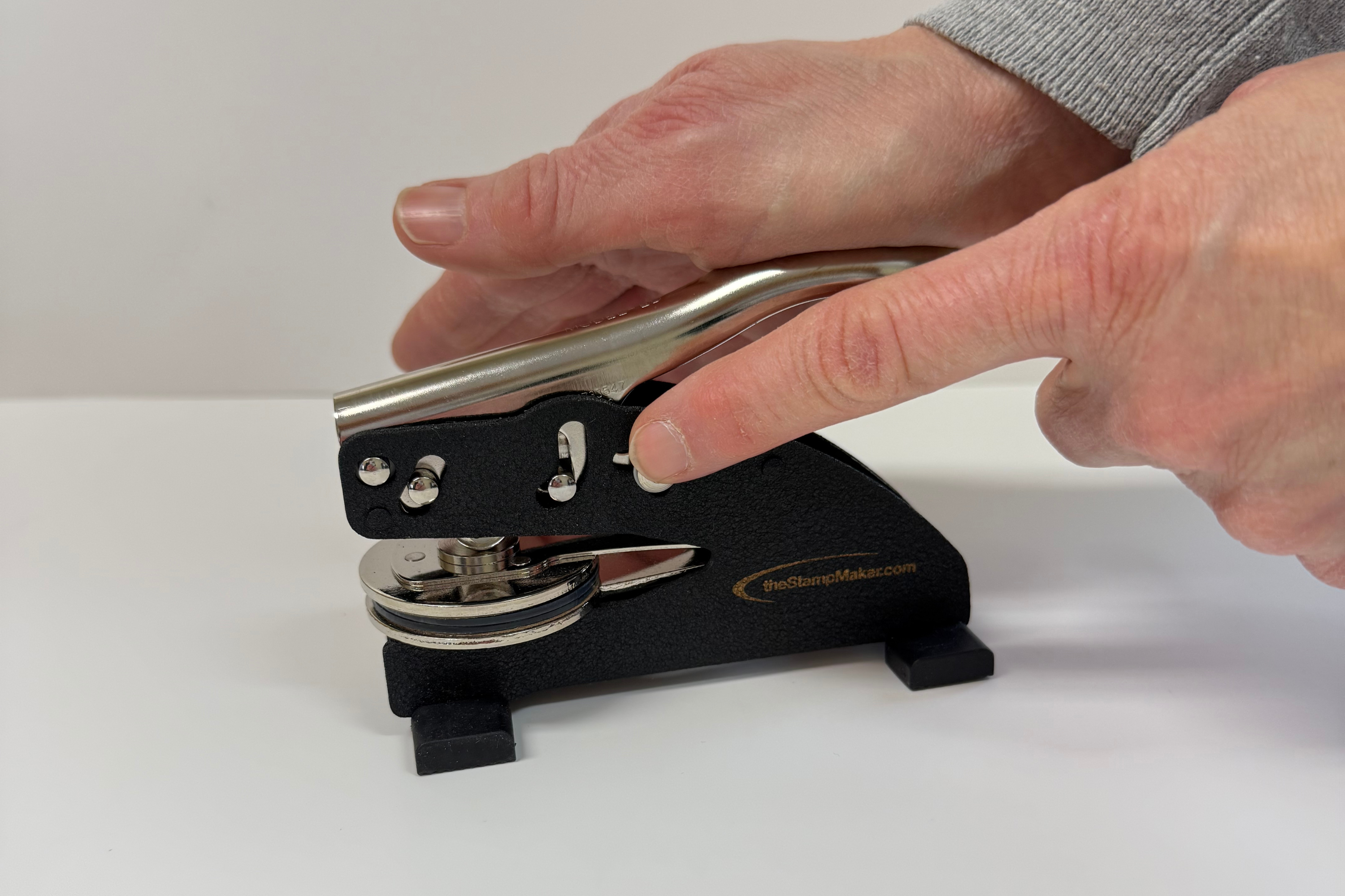 Move the lock down on your Shiny Embossing Seal